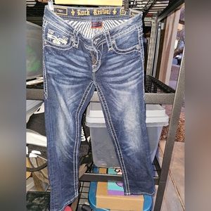 ROCK REVIVAL Women's Iselin Capri Rhinestone Flap Dark Blue Jeans 24 (27x24).